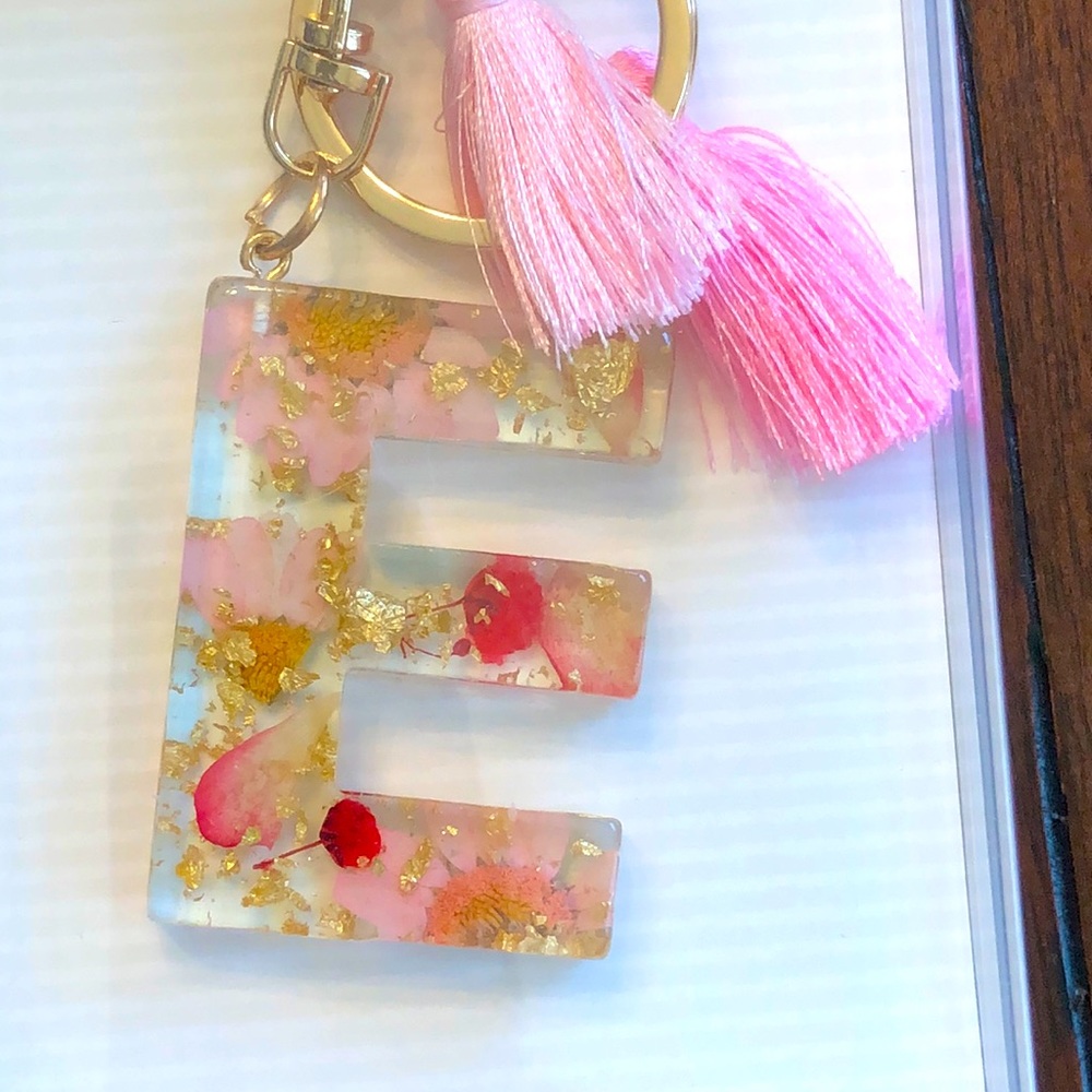 COPY - NIB clip on keychain pressed flower with tassel. Initial E.